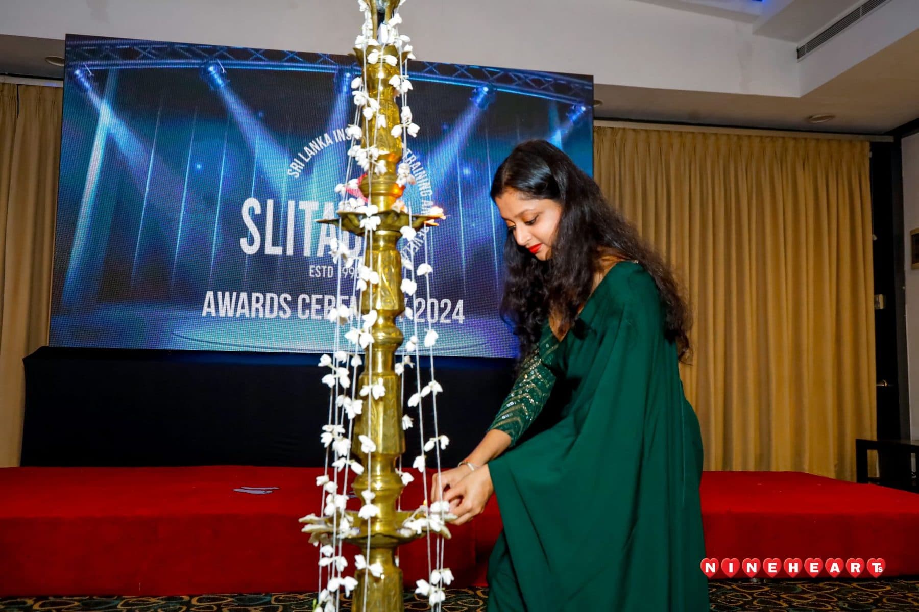 Lighting the oil lamp to open the 2024 awards ceremony