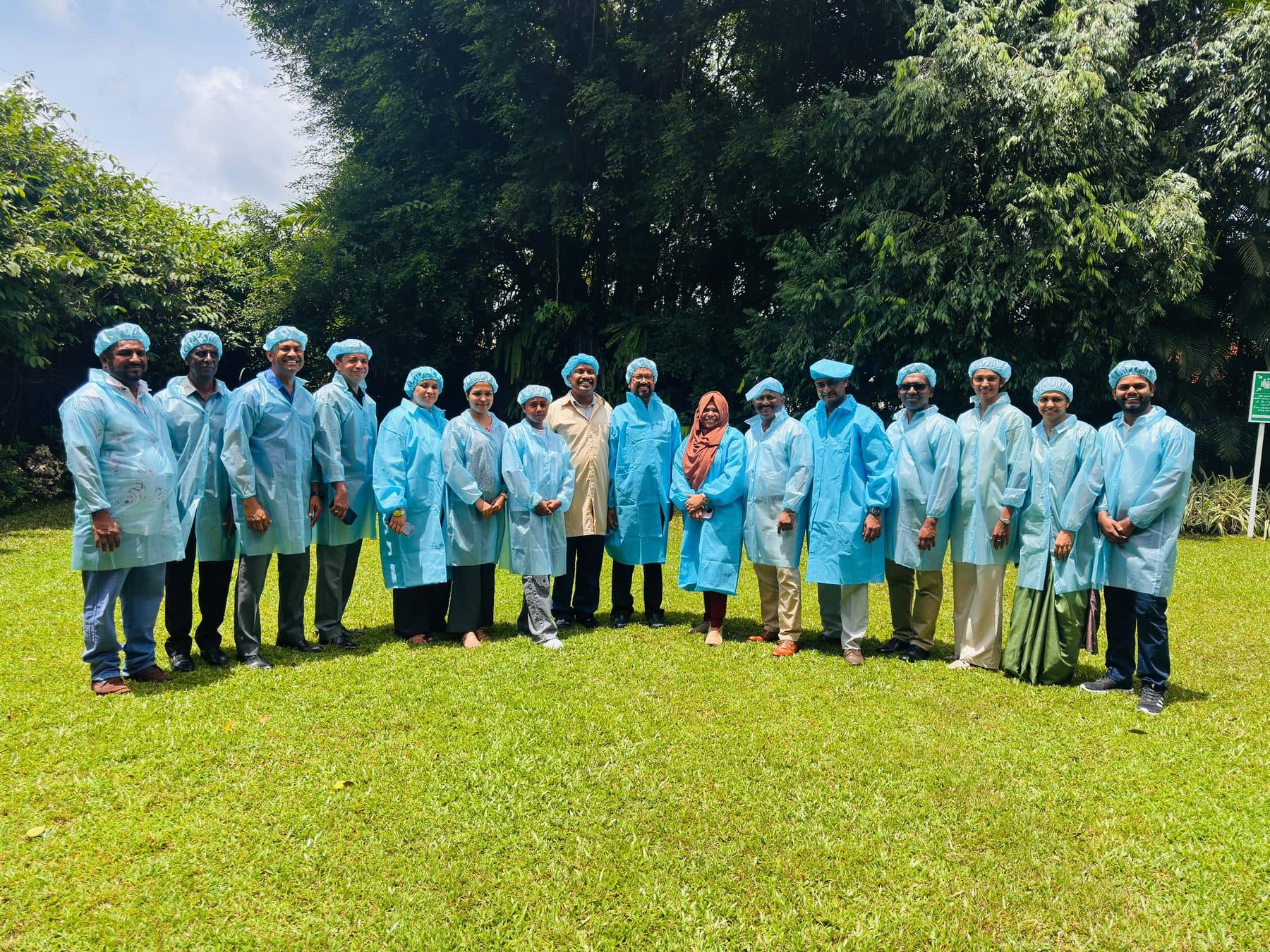 SLITAD students in protective coats on a site visit to a manufacturing plant